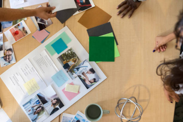 istock Bird's eye view of conference table during creative design meeting 1091866182