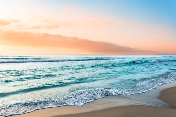 istock Colorful ocean wave, sea water. Sunset light and beautiful clouds on background. 1091866432
