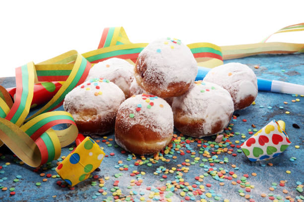istock German donuts with jam and icing sugar. Carnival powdered sugar raised donuts 1091872040