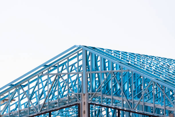 House construction steel frame, background with copy space House construction steel frame, background with copy space, horizontal composition structural steel stock pictures, royalty-free photos & images