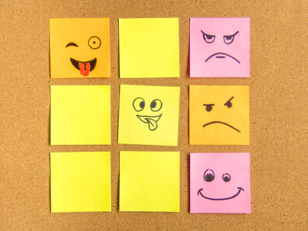 istock post-it notes with different face expression arranged as a tic tac toe games on cork board office school abstract concept photo 1091877386