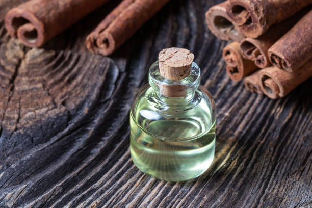 istock A bottle of cinnamon essential oil with cinnamon 1091878166