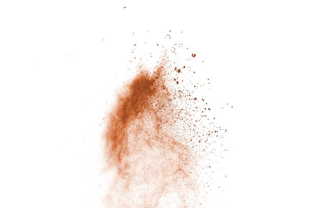 istock Brown color powder explosion on white background. Colored cloud. Colorful dust explode. Paint Holi. 1091880078