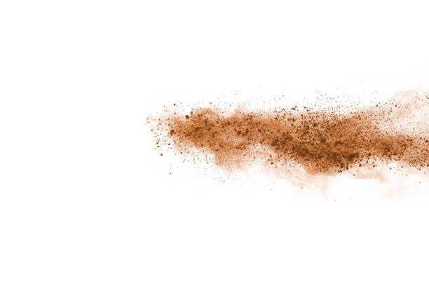 istock Brown color powder explosion on white background. Colored cloud. Colorful dust explode. Paint Holi. 1091880086