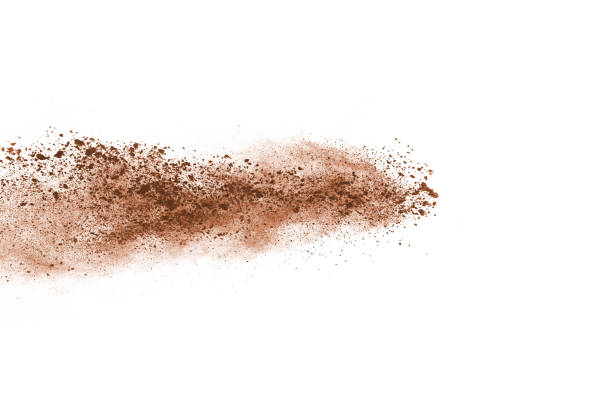 istock Brown color powder explosion on white background. Colored cloud. Colorful dust explode. Paint Holi. 1091880088