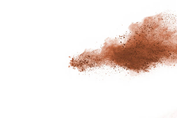 istock Brown color powder explosion on white background. Colored cloud. Colorful dust explode. Paint Holi. 1091880138