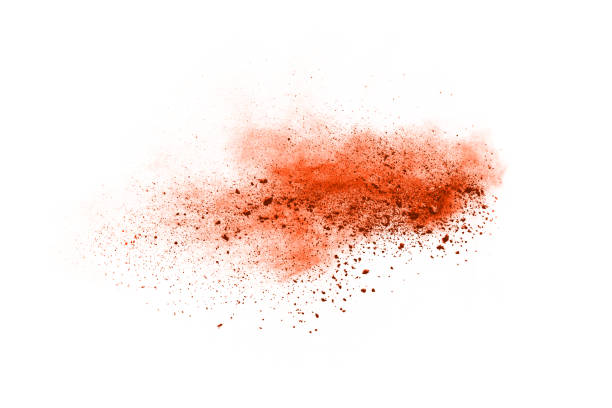istock Orange powder explosion on white background. Colored cloud. Colorful dust explode. Paint Holi. 1091880732