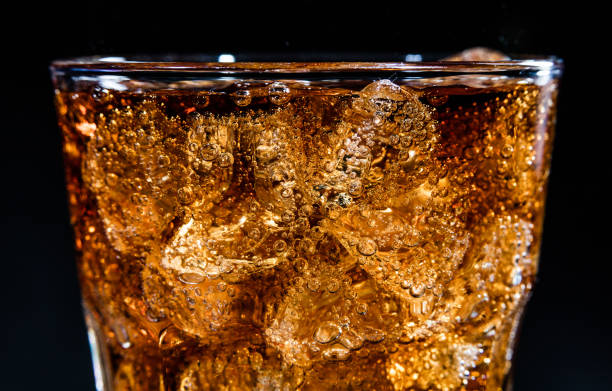 istock Glass with soft cola drink, ice and bubles 1091885148