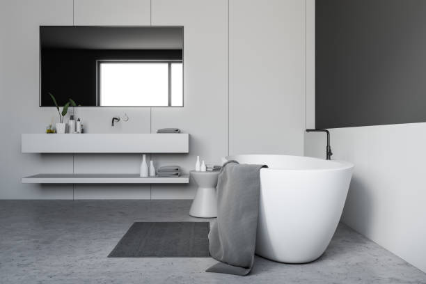 istock Gray and white bathroom, tub and sink 1091888686