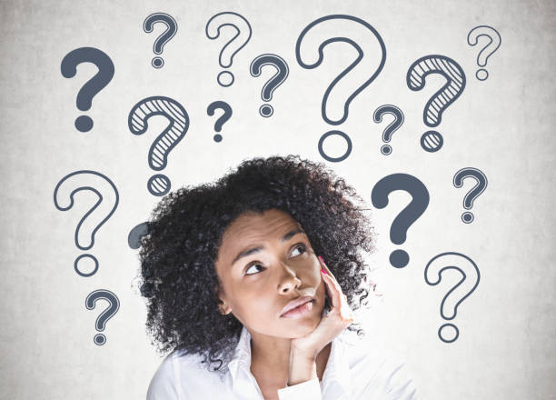 istock Thoughtful african american woman, question marks 1091888954