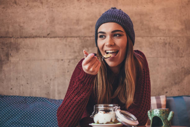 istock Pretty woman enjoys her breakfast 1091892708
