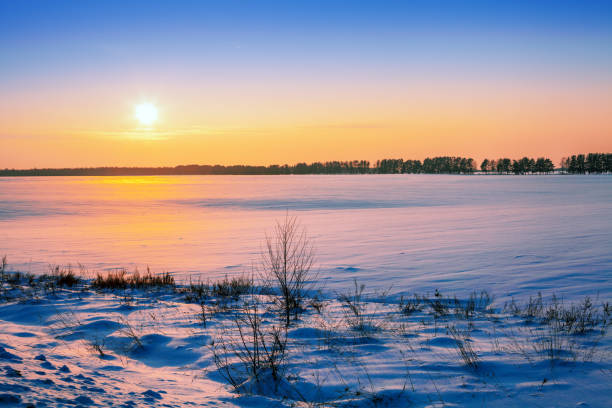 istock Rural winter landscape. Snowy field at sunset light 1091893006