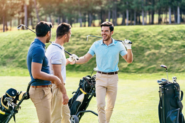 istock Group of golfers meet on the field 1091896206