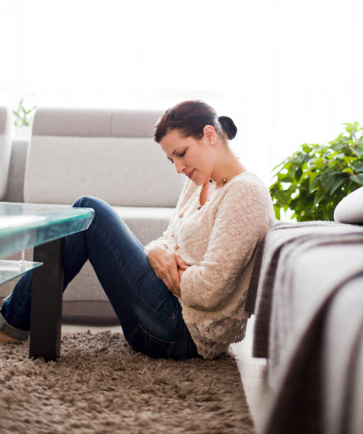 istock Woman Experiencing Abdominal Pain 1091896482