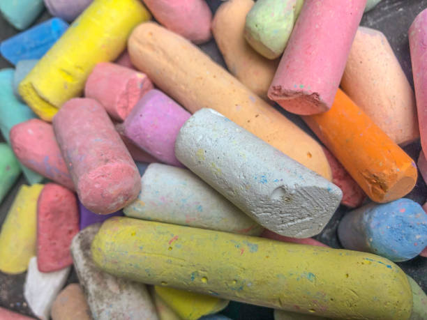 istock scattered a lot of colored chalk. Background for splash screen 1091901196