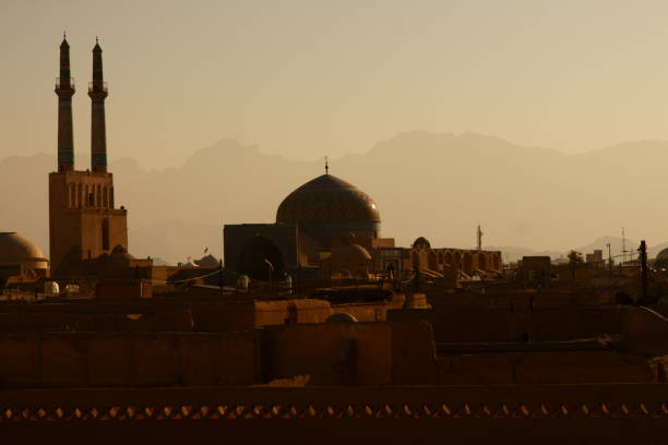 istock Mosque and windtower. Yazd old city. Iran 1091901424