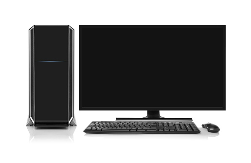 Portrait of an young Caucasian computer programmer working on a computer at the open space office, with coworkers