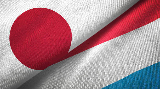 istock Luxembourg and Japan two flags together realations textile cloth fabric texture 1091904484