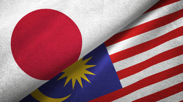 istock Malaysia and Japan two flags together realations textile cloth fabric texture 1091904510