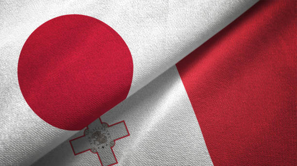 istock Malta and Japan two flags together realations textile cloth fabric texture 1091904514