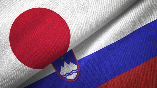 istock Slovenia and Japan two flags together realations textile cloth fabric texture 1091905616