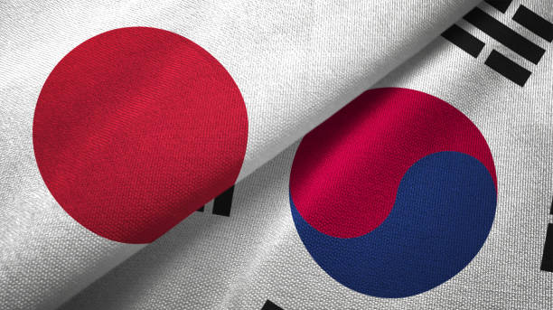 south korea and japan two flags together realations textile cloth fabric texture - japanese flag flag japan textile imagens e fotografias de stock