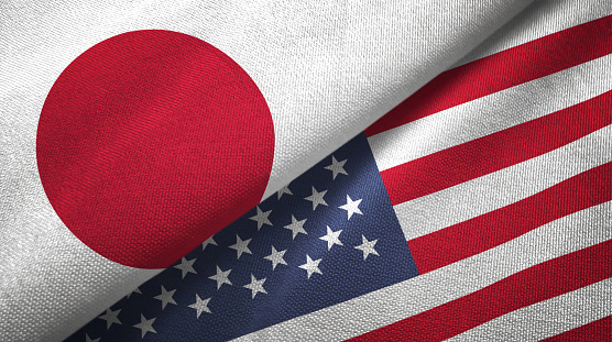 United States and Japan two flags together realations textile cloth fabric texture