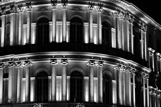 istock Vintage architecture classical facade illuminated at night. Black and white. 1091908396