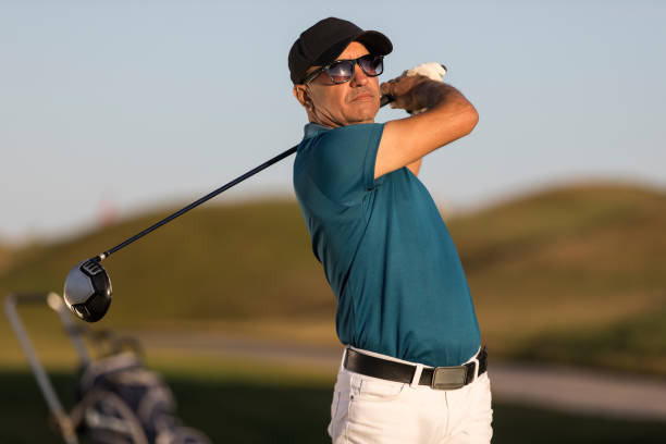 istock Golf player looking after shoting ball -  Links Golf 1091914640