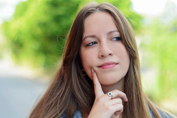 istock Beautiful thoughtful woman 1091919838