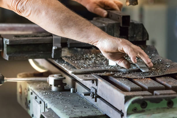 istock A male worker operating a milling cutter drill machine inside an aluminium factory. 1091922294
