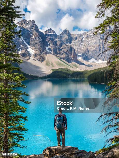 Hiker At Moraine Lake In Banff National Park Alberta Canada Stock Photo - Download Image Now
