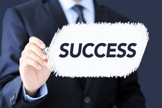 istock Businessman Writing Success Concept Text 1091924242