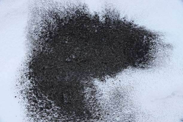 black white background of ash and snow outside