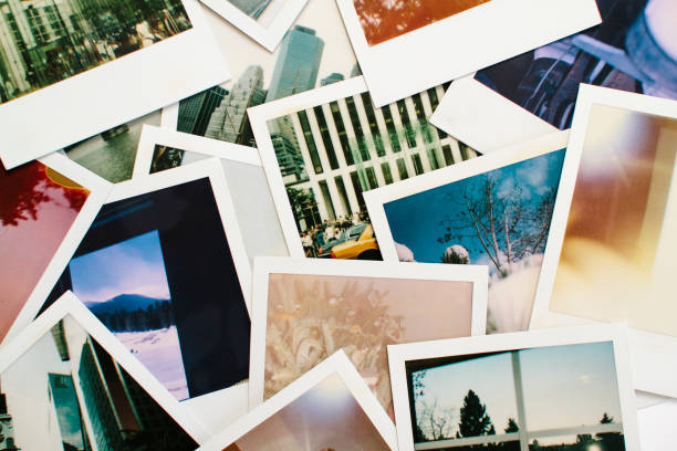 variety of colorful instant film polaroid pictures - pilha arranjo ilustrações imagens e fotografias de stock