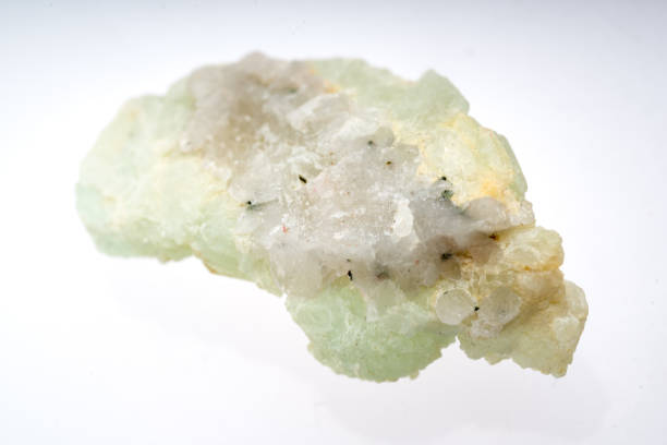 istock Prehnite mineral stone sample with white background 1091941146