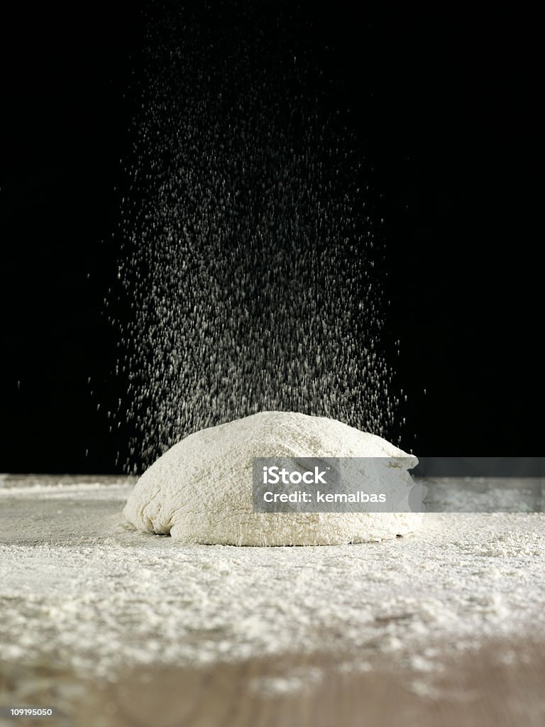 Dough ball sitting on counter sprinkled with flour dough Baking Stock Photo