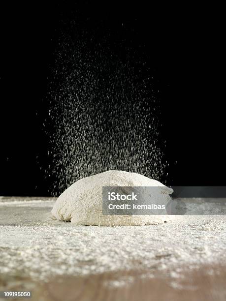 Dough Ball Sitting On Counter Sprinkled With Flour Stock Photo - Download Image Now - Baking, Falling, Backgrounds