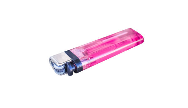istock Isolated pink or red plastic gas lighter on white background with clipping path ,horizontal 1091959208