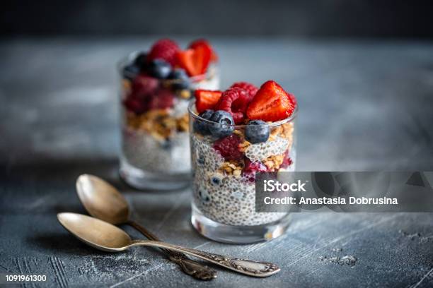Healthy Dessert With Chia Seeds Blueberries Strawberries Raspberries And Granola Horizontal Stock Photo - Download Image Now