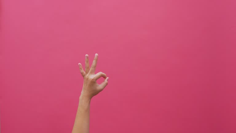 Signs language hand isolated pink background 4k