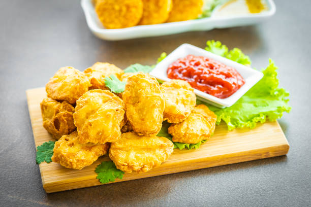 istock Deep fried chicken meat call nugget with tomato or ketchup sauce 1091995264