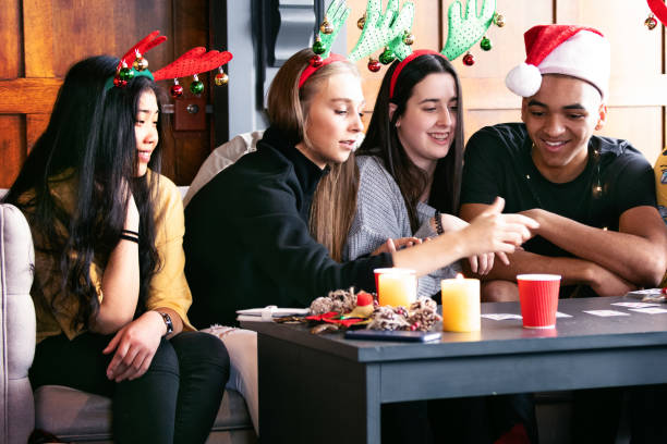 istock Generation z Christmas party with multi-ethnic friends 1091995624