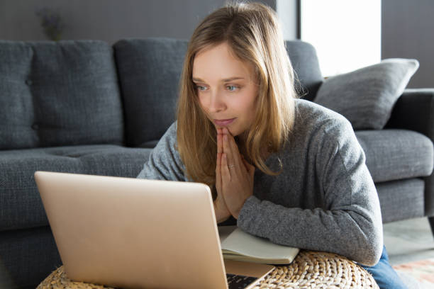 positive girl having video call and asking for help - prayer call imagens e fotografias de stock