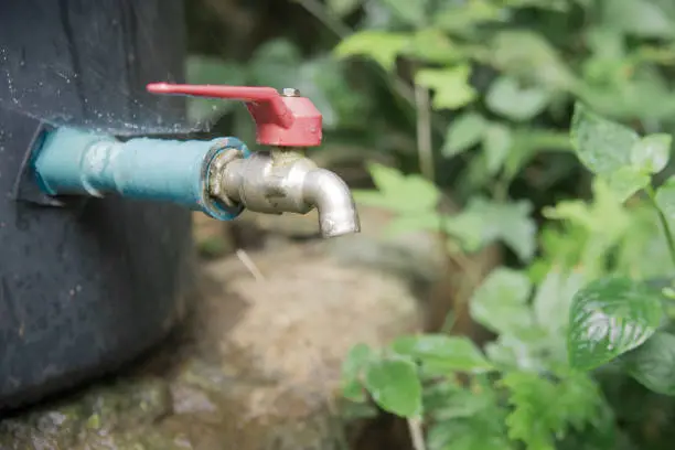 Photo of Old Silver faucet in natural