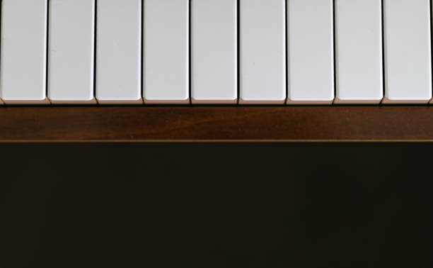 istock Overhead close up of white piano keys 1092023908