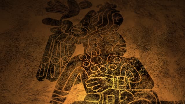A mysterious Mayan or Aztec symbol on cave wall with candlelight illumination