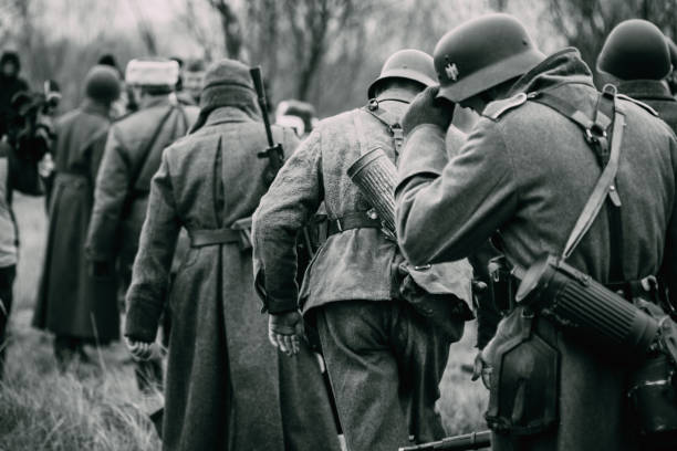 The captured soldiers of Germany go for the Red Army Gomel, Belarus - November 26, 2017: German soldiers in captivity go in line for Soviet soldiers german armed forces stock pictures, royalty-free photos & images