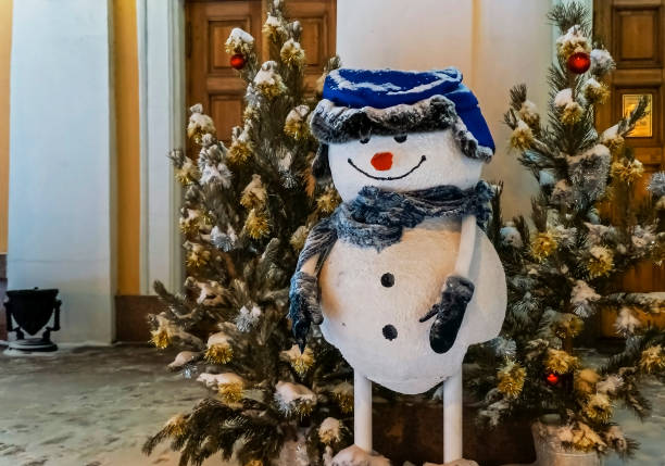 istock merry Christmas snowman winter night 1092049284