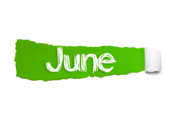 istock The word June appearing behind green torn paper 1092055690